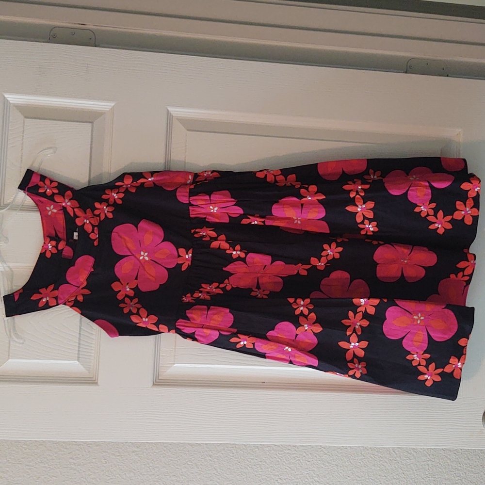 Black kids dress up w/ orange and pink flowers from Emily West